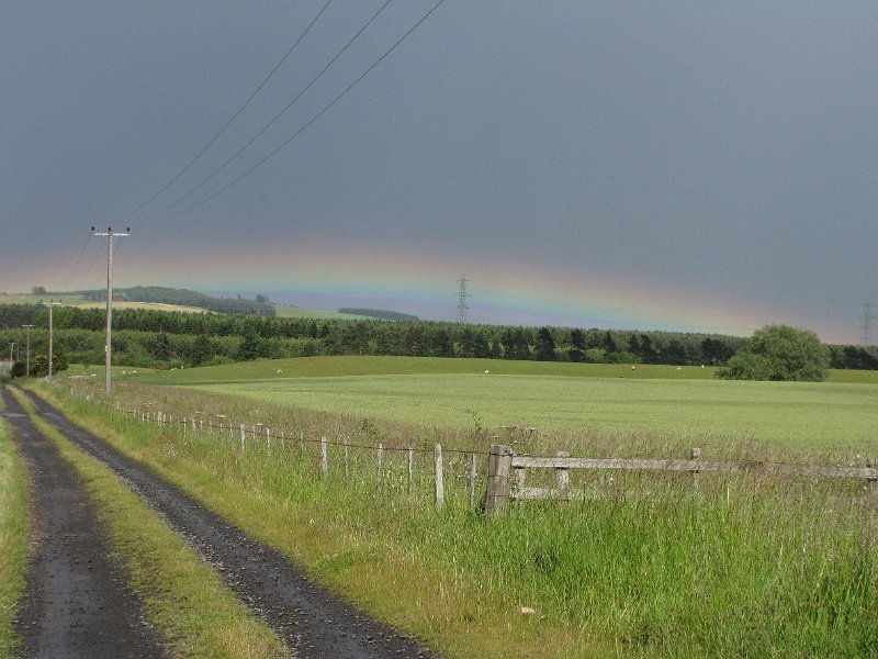 the borders_onweer.jpg - Op de terugweg naar de camping dit prachtige natuurverschijnsel. De hele horizon is één grote regenboog.